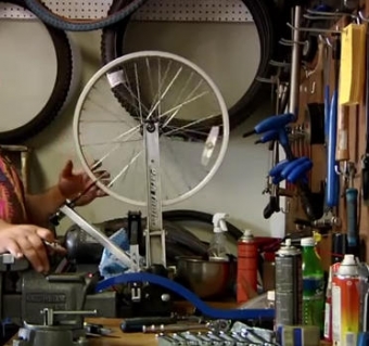 Straightening a bicycle tire