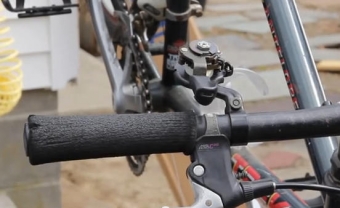 Once you get the cover off the shifter you'll probably easily find the problem. Unfortunately you need that cover off to diagnose. fixing a stuck bike shifter